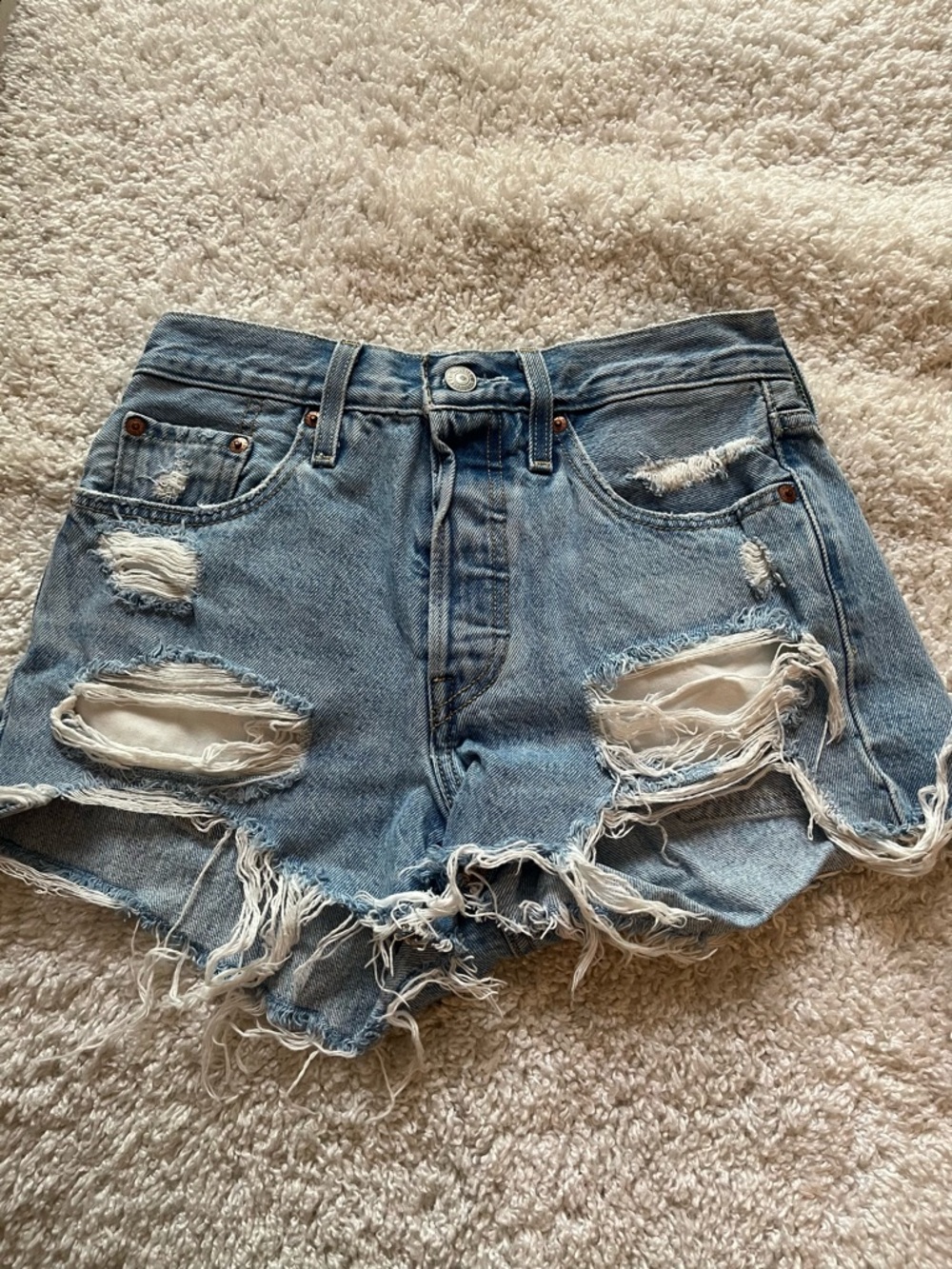 Levi’s 501 Distressed medium wash shorts